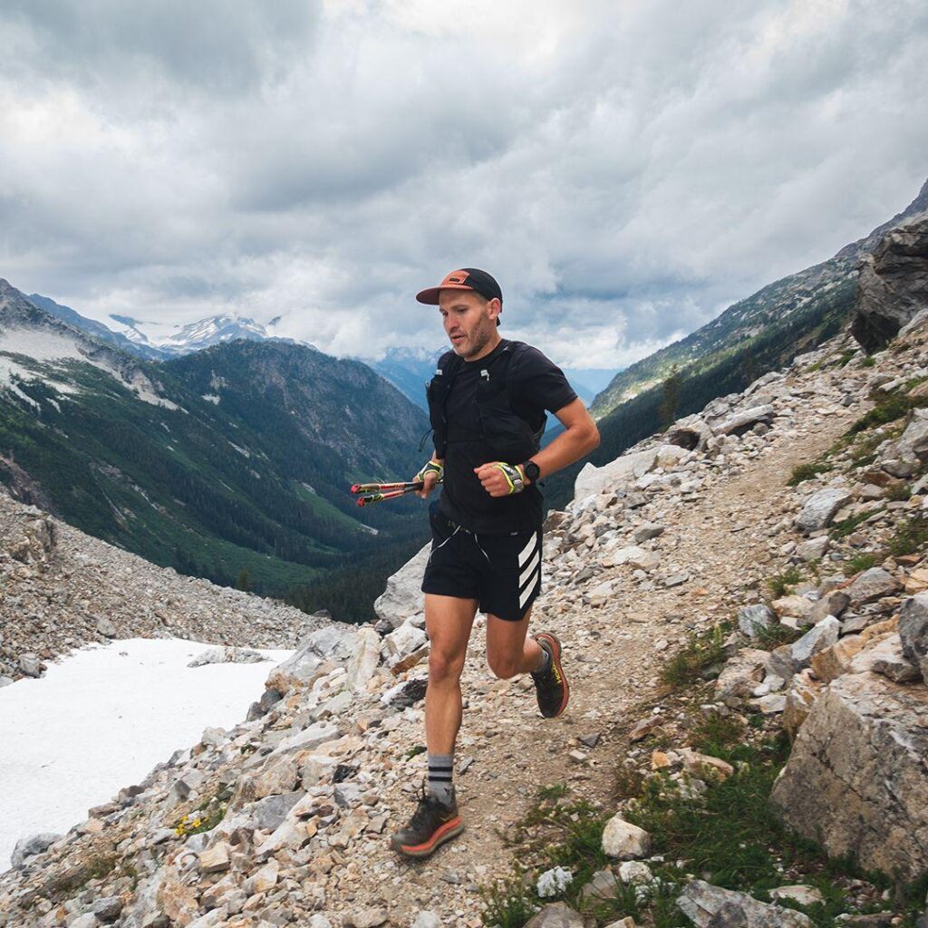 Brandon running on a rocky trail.